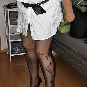 In white blouse gallery image