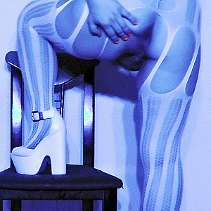 catsuit in blue light gallery image