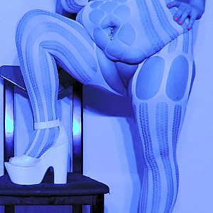 catsuit in blue light gallery image