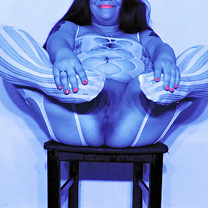 catsuit in blue light gallery image