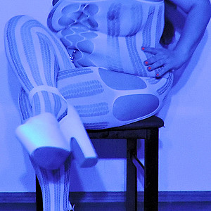 catsuit in blue light gallery image