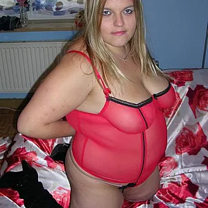 red corsage with a dildo gallery image