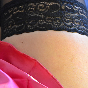 pink negligee and black nylons gallery image