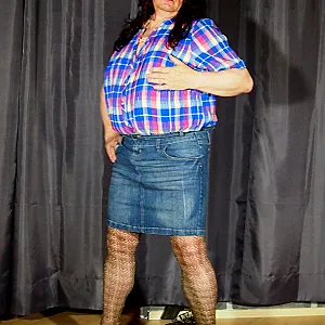 in a jeans skirt gallery image
