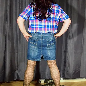 in a jeans skirt gallery image