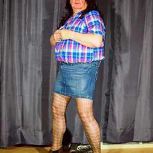 in a jeans skirt gallery image