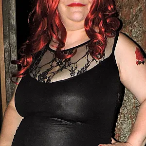 Zeigegeil im sexy Lederkleid Galeriebild