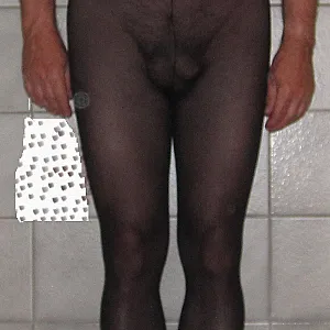 nude slave in a pantyhose gallery image