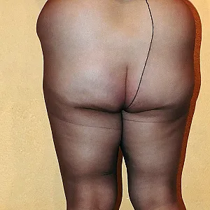 Weiße Heels und braune Strumpfhose Galeriebild