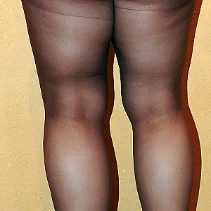 white heels and brown pantyhose gallery image