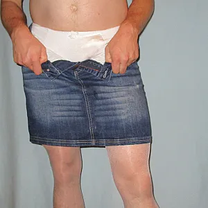 strip in a jeansskirt gallery image