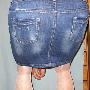 strip in a jeansskirt gallery image
