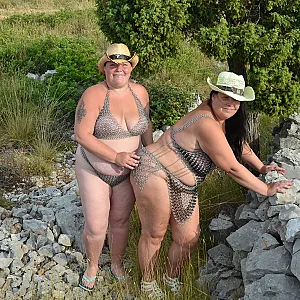 In chain lingerie at stone wall 1 gallery image