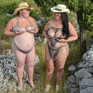 In chain lingerie at stone wall 1 gallery image