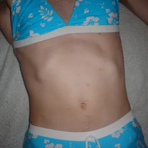 wanking in blue bikini gallery image
