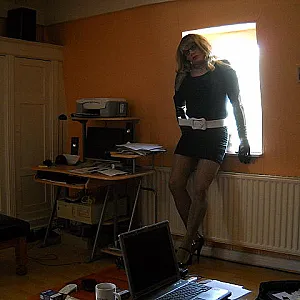secretary in miniskirt gallery image