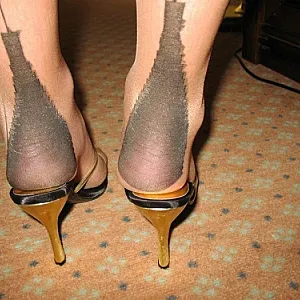 skincolored nylons and heels gallery image