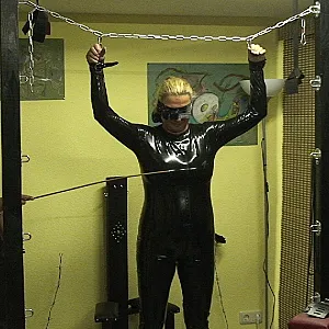 Latex slave girl ... gallery image