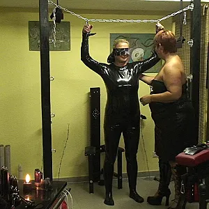 Latex slave girl ... gallery image