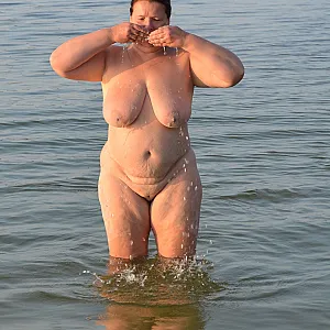 Breasts wash at nude lake 1 gallery image