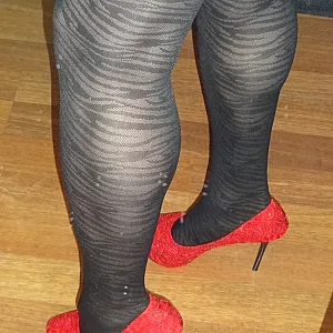 How do you like my red heels? gallery image