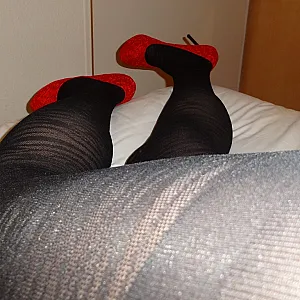 How do you like my red heels? gallery image