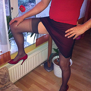 HE in red highheels gallery image