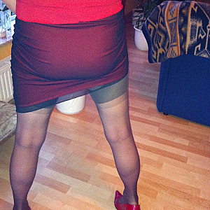 HE in red highheels gallery image