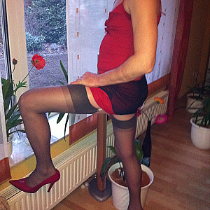 HE in red highheels gallery image