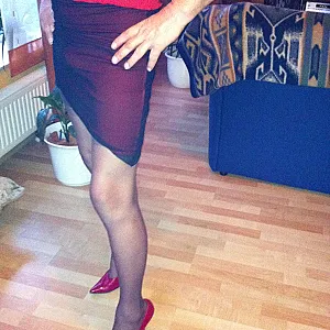 HE in red highheels gallery image
