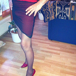 HE in red highheels gallery image