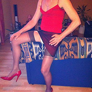 HE in red highheels gallery image