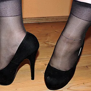 nude in black high heels gallery image