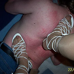 Trampling with red heels gallery image