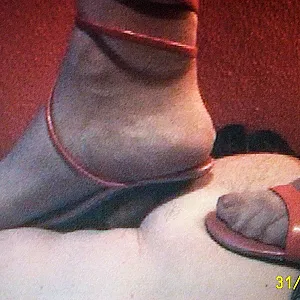 Trampling with red heels gallery image