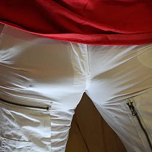 Ringed spread balls, tight jeans gallery image