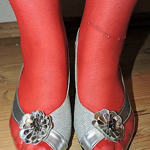 red straps and leather corsage gallery image
