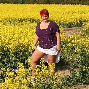 Bare tits in field gallery image