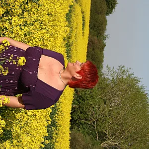 Bare tits in field gallery image