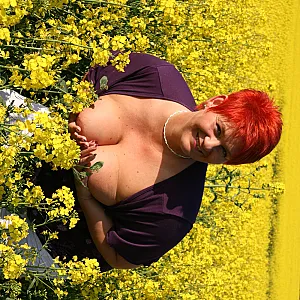 Bare tits in field gallery image