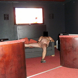 alone in the porn movie theatre gallery image