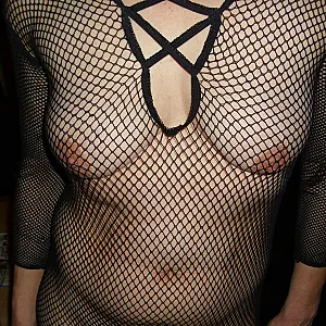 in a black catsuit gallery image