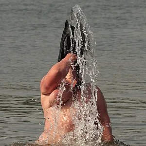 Water games at the nudist lake 1 gallery image
