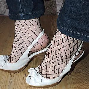 Netzstrumpfhose und Jeans Galeriebild