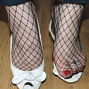 Netzstrumpfhose und Jeans Galeriebild