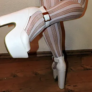 catsuit and heels gallery image