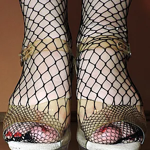 Netzstrumpfhose und Gogo High Heels Galeriebild
