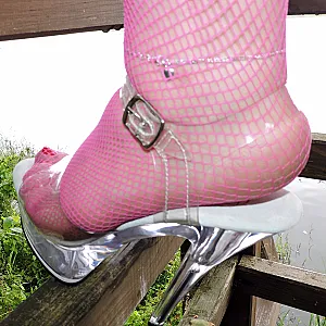 pink fishnet on beach gallery image