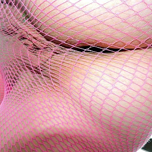 pink fishnet on beach gallery image