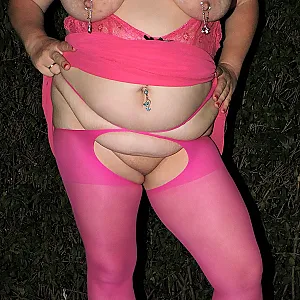 in pink with a analplug gallery image